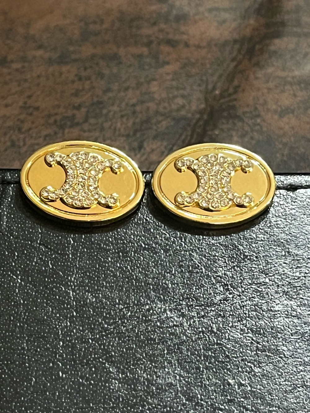 Celine. Triomphe. Oval Gold Tone Rhinestone Stud Earrings